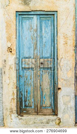 Vintage Old Blue Wooden Front Door Of Mediterranean House