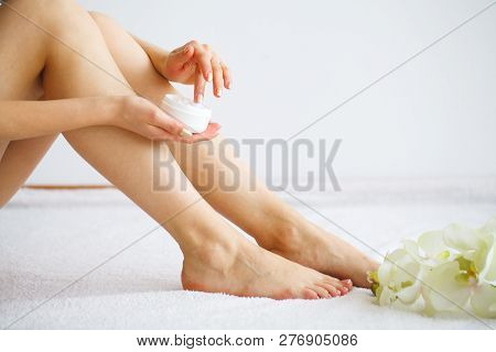 Hair Removal. Close Up Woman Hands Touching Long Legs, Soft Skin