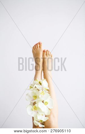 Hair Removal. Close Up Woman Hands Touching Long Legs, Soft Skin