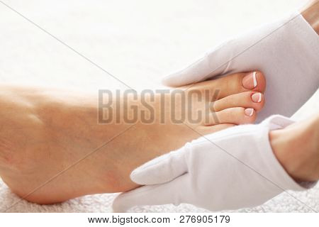 Hair Removal. Close Up Woman Hands Touching Long Legs, Soft Skin