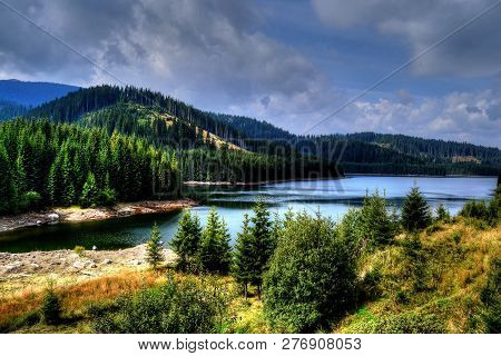 Water Storage Between The Mountains. Vidra Lake, Romania.