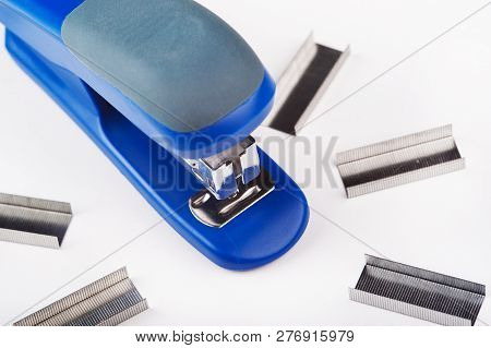 Office Stapler With Staples On A White Background.