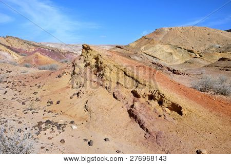 Colored sands in the Makhtesh Gadol erosion crater in the desert in Israel