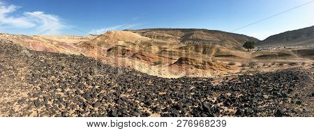 Panorama of the erosion crater Makhtesh Gadol and oasis in the Negev desert, Israel