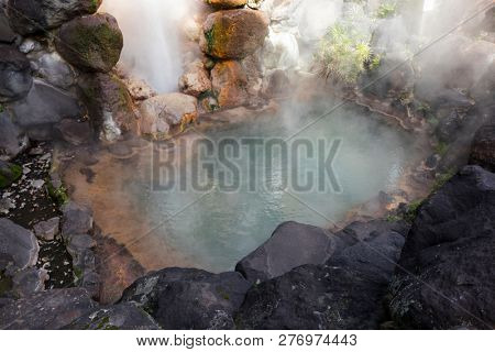 Beppu, Japan - November 2, 2018: Tatsumaki Jigoku geyser, a natural monument, on the hell tour in Beppu