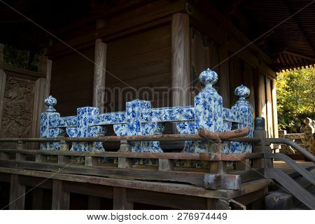 Arita, Japan - October 30, 2018: Detail of the Tozan shrine in Arita with a balustade made out of blue and white Arita porcelain