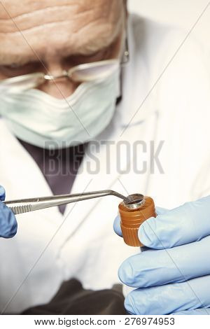 Proccess Of Collecting Possible Gunshot Residue From Suspected Clothes In Police Lab