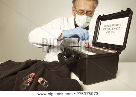 Proccess Of Collecting Possible Gunshot Residue From Suspected Clothes In Police Lab
