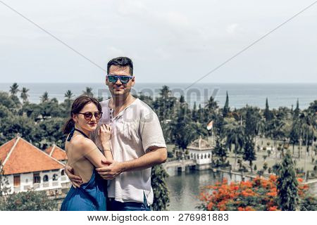 Bali, Indonesia - December 29, 2018: Young Couple At Taman Ujung Water Palace.