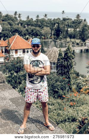 Bali, Indonesia - December 29, 2018: Young Man At Taman Ujung Water Palace.