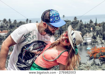 Bali, Indonesia - December 29, 2018: Young Couple At Taman Ujung Water Palace.