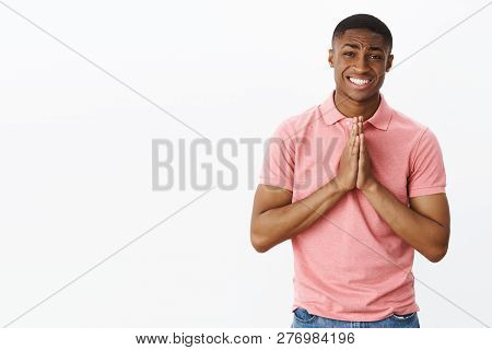 Please Really Need Your Help. Charming Sincere African American Young Guy Asking For Favour Holding 