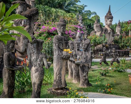 vientiane, laos - november 22, 2018: xieng khuan - buddha park. collection of statues of buddhist and hindu gods.