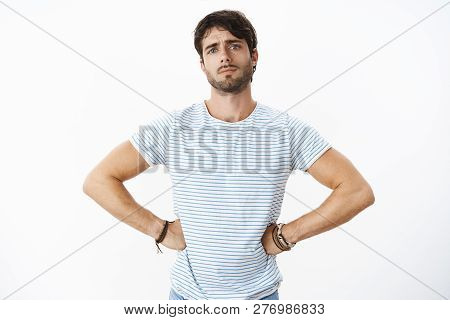 Unretouched Shot Of Handsome European Man With Beard And Blue Eyes Feeling Upset And Disappointed As