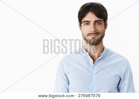 Friendly-looking Optimstic And Handsome Mature And Masculine Male With Blue Eyes And Bristle Smiling