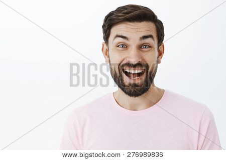 Headshot Of Amused Excited Joyful 30s Man With Beard Laughing Out Loud, Having Fun Standing Entertai