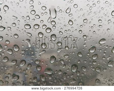 Rain Drop At The Window See Thru The Town In The Rain Blurry
