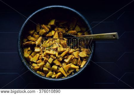 Stir Fried Breadfruit Dish From Kerala, Locally Known As Kadachakka Mezhukkupuratti, Served On A Cla
