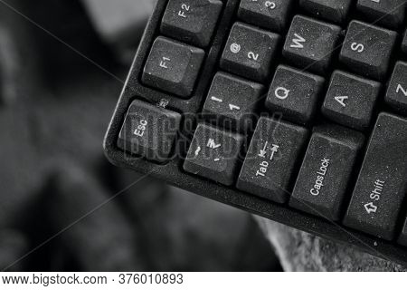 Black And White Image Of A Computer Keyboard With Dust Particles And Stain.