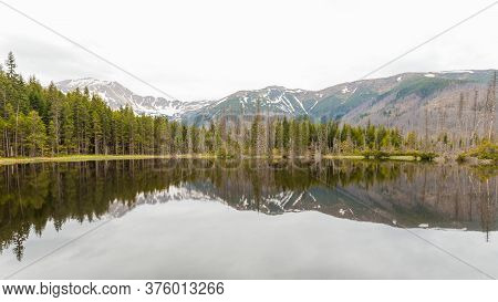 Smreczynski Pond, Tatra National Park, Poland. Mountain Lake In The Forest