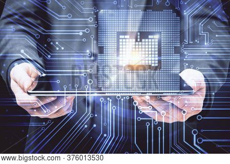 Businessman Hands Holding Digital Tablet With Circuit Hologram. Technology And Computing Concept. Do