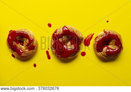 A Homemade Cruller Donuts With Strawberry Jam