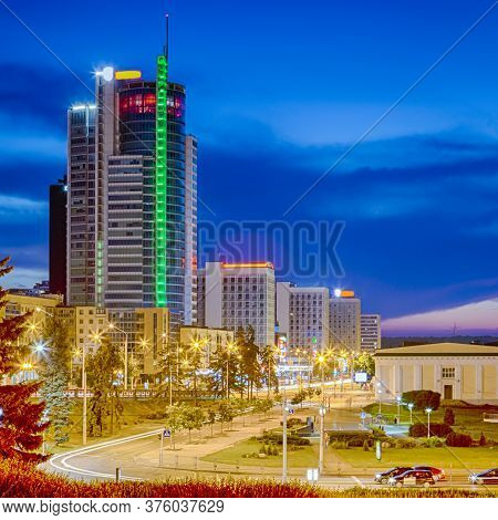 Belarus Travel Destinations. Minsk City Night View With Pobediteley Avenue And Newly Built Houses At