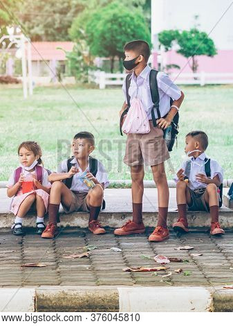 Kanchanaburi,thailand-july 2,2020:unidentified Elementary School Students Wear Face Mask To Prevent 