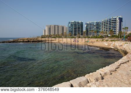 Cala Piteras, Spain-july 1st 2019: Beautiful Weather Attracted Visitors And Holidaymakers To The Bea