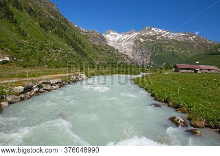 Rhone glacier, source of Rhone river, melting and retreating due to global warming. Rhone glacier is loosing up to 2 meters in length every year.