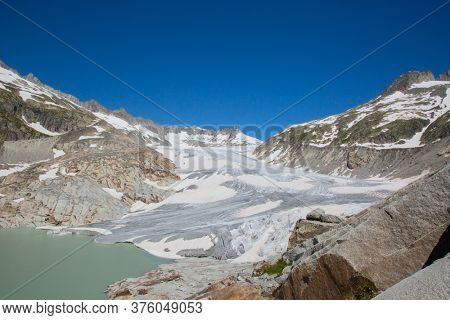 Rhone glacier, source of Rhone river, melting and retreating due to global warming. Rhone glacier is loosing up to 2 meters in length every year.