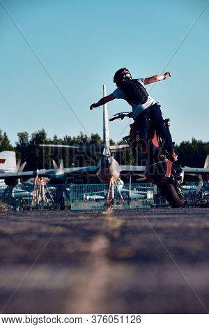Moscow, Russia - 12 Jul 2020: Moto Rider Making A Stunt On His Motorbike. Stunt Motorcycle Rider Per