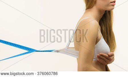 Woman Wearing Too Big Bra, Loose Band
