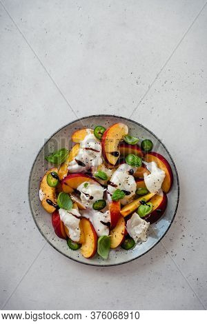 Fresh Summer Salad With Peaches And Buratta Cheese