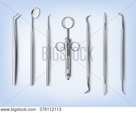 Dentist Tools With Dental Syringe On Blue Background