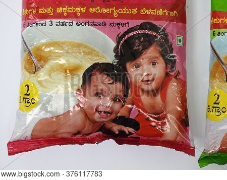 Closeup Of Two Different Types Pink And Green Color Government Of Karnatakas, Dwcd Department Packed