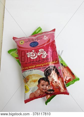 Closeup Of Two Different Types Pink And Green Color Government Of Karnatakas, Dwcd Department Packed