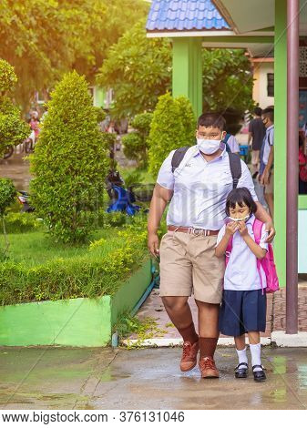 Kanchanaburi,thailand-july 2,2020:thai Students Wear Various Medical Masks To Prevent Themselves Fro