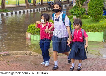 Kanchanaburi,thailand-july 2,2020:thai Students Wear Various Medical Masks To Prevent Themselves Fro