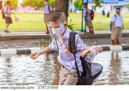 Kanchanaburi,thailand-july 2,2020:thai Students Wear Various Medical Masks To Prevent Themselves Fro