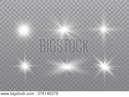 White Glowing Light Explodes On A Transparent Background. Sparkling Magical Dust Particles. Bright S