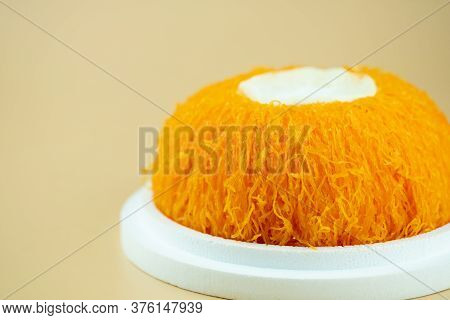Egg Thread Cake (fios De Ovos) Topped With Creamy Coconut Whipped Cream. Thai Dessert Style