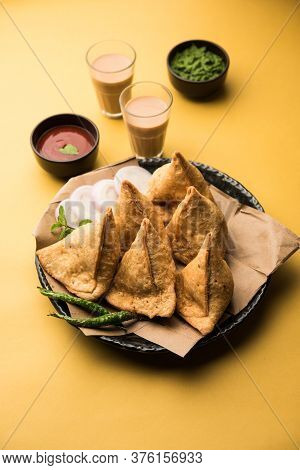 Samosa snack Is An Indian Deep Fried Pastry With A Spiced Filling Usually Made With Potatoes, Spices