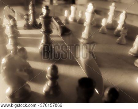 Chess Pieces And Knife