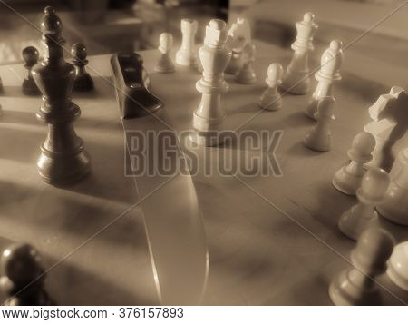 Chess Pieces And Knife