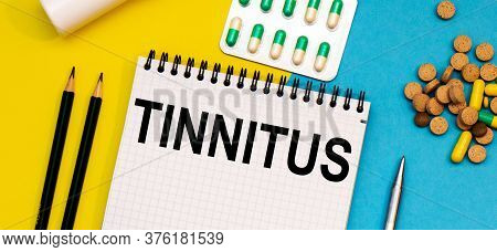 Treatment Word, Tinnitus Word With Medical Concepts And Medical Equipment