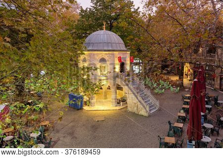 Tea gardens and silk shops in Koza Han Silk Bazaar. Koza Han is historical place from Ottoman times in Bursa, Turkey