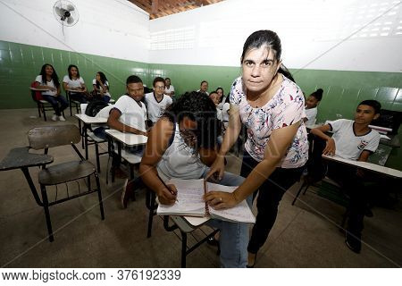 Pojuca, Bahia / Brazil - August 1, 2019: Teacher Is Seen Together With Students In A Public School R