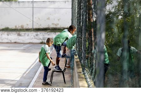 Alagoinhas, Bahia / Brazil - August 1, 2019: Public School Student Is Seen Near The School's Sports 