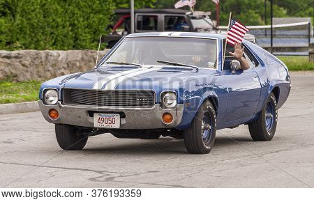 Fairhaven, Massachusetts, Usa - July 4, 2020: Amc Amx Muscle Car Passing Fort Phoenix During Fairhav